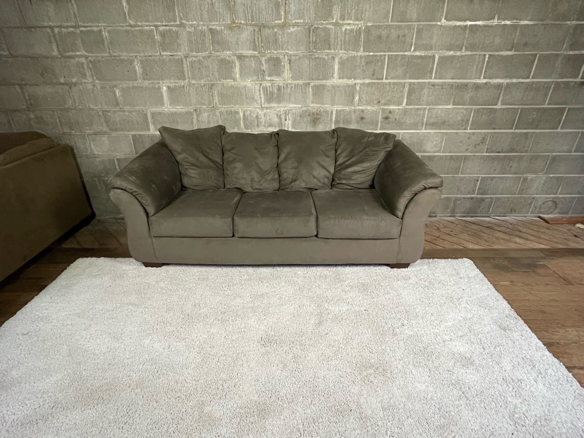 Grey Couch “WE DELIVER”