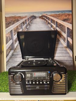 Unique 50's Retro Vinyl Record Player.  Includes CD playback and Bluetooth