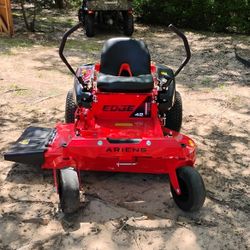Brand New 42" Zero Turn Mower Only Has 4 Hours In Excellent Condition $2,500.Firm