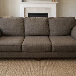 Modern Modern Grey couch, three seater! Can deliver with deposit.