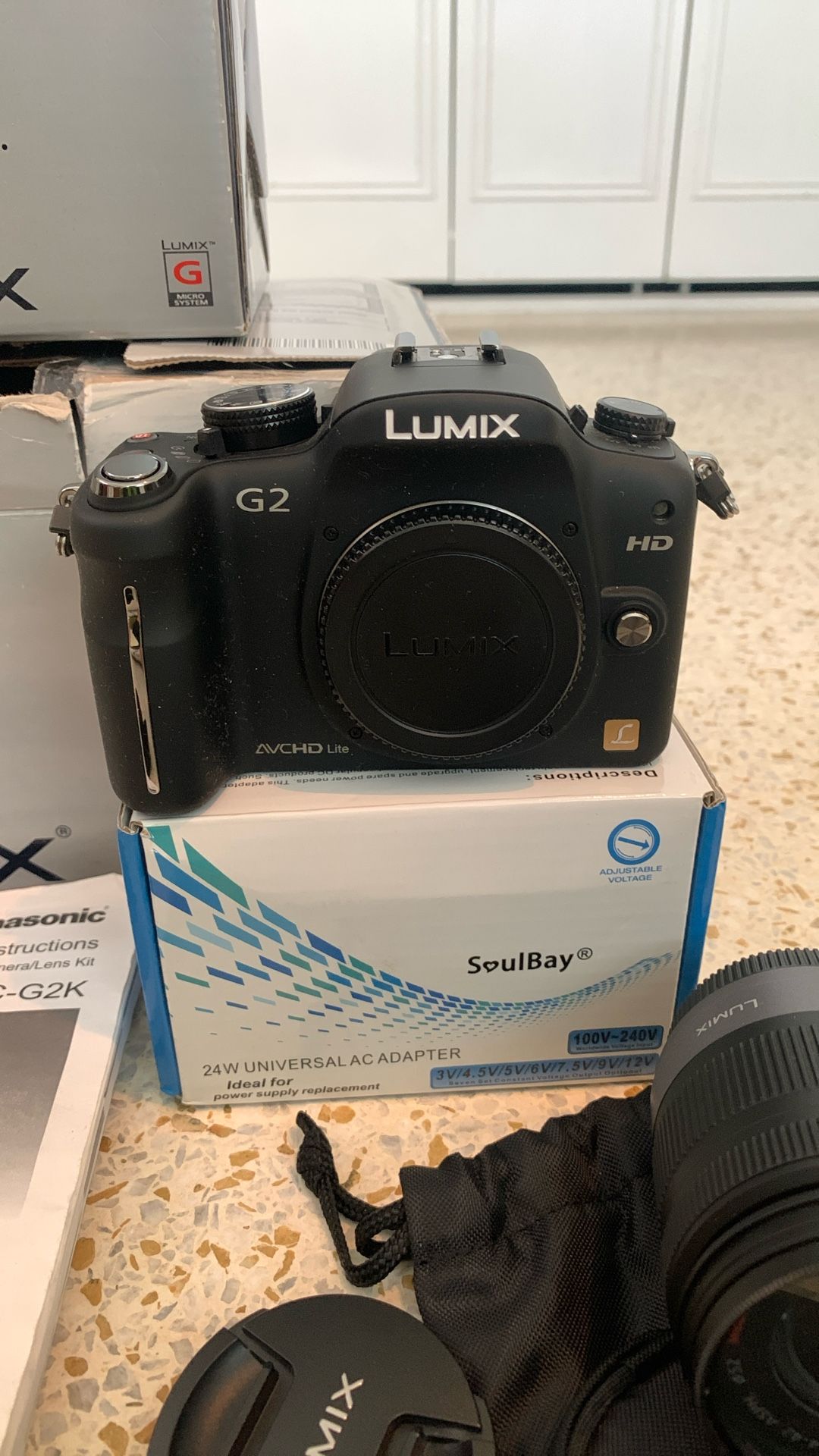 Panasonic DMC-G2 with 52mm Lens, Charger, Book And Battery