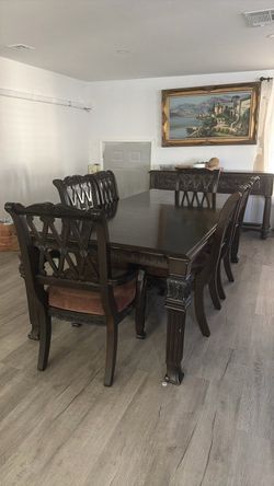 Elegant Dark Wood Dining Table Set With Matching Chairs