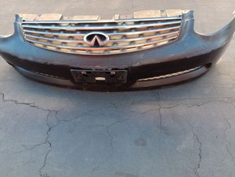 2003-2006 Infiniti G35 Coupe complete front bumper with Grill and emblem and side light.