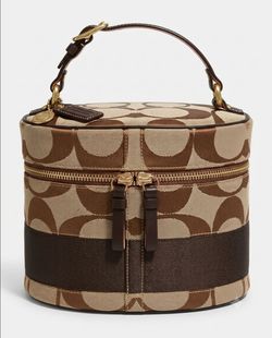 Authentic COACH brown signature  vanity bag.