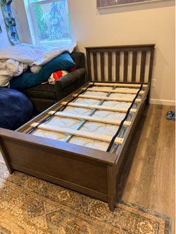 Twin bed with trundle and mattress