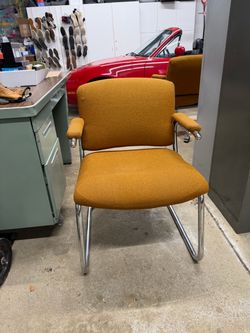 Orange chrome-frame chair