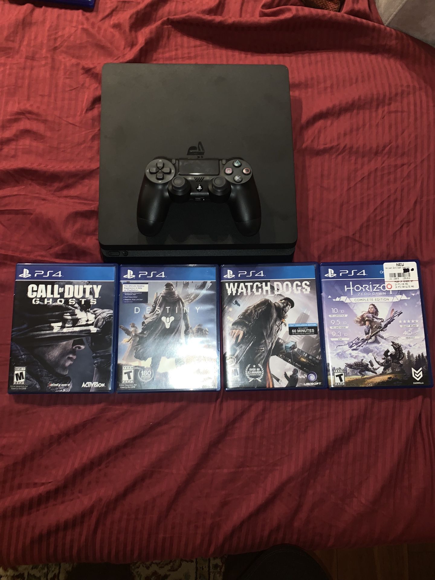 PS4 Slim 1TB w/4 games and 1 controller!!!