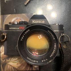 Konica Autoreflex TC with Hexanon 57mm f/1.4 lens. Untested. Lens has haze/fungus. Sold as-is. $70 OBO.”