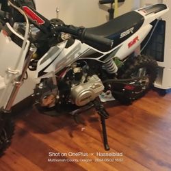 White 110 SSR Dirt Bike $750