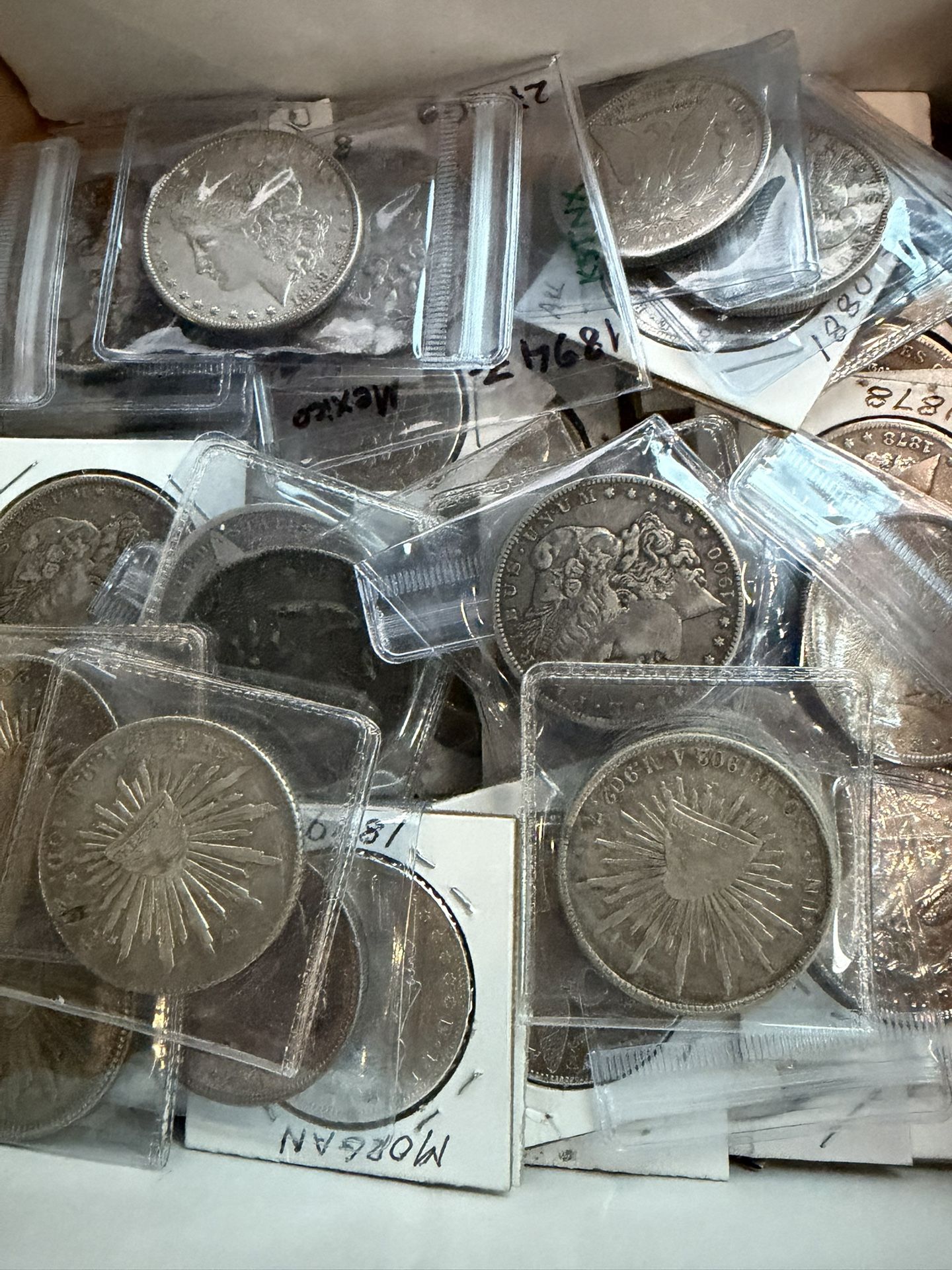 DIFFERENT DATES SILVER MORGAN DOLLARS 