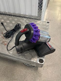 Kimdog Mattress Vacuum Cleaner, a corded, handheld unit designed to remove dust, allergens, and pet hair