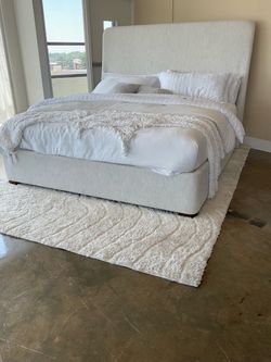 New in a box Upholstered Queen Wingback Bed .