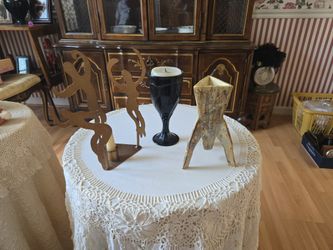 Vintage wine, goblet space shuttle and dancing women.