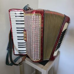 Vintage Red Hohner Piano Accordion.