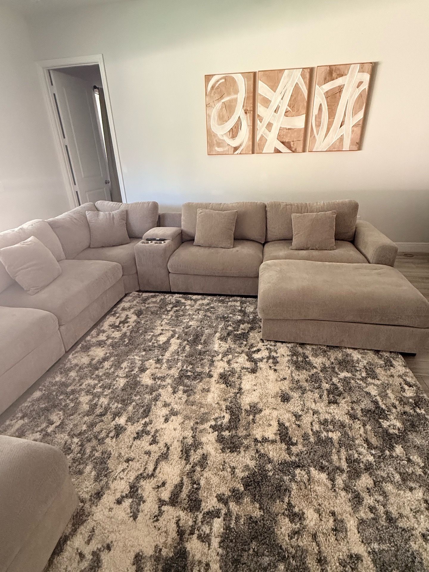 Large modular sectional sofa with console and cup holders