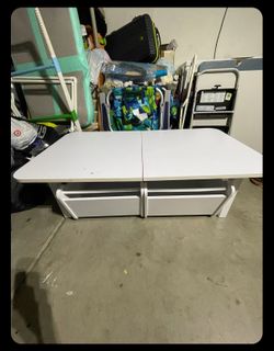 Table with storage drawers( low to ground)