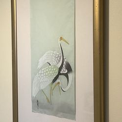 Framed Asian Crane Artwork with Light from above it.