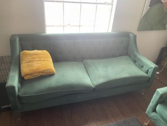 Two green Sofas