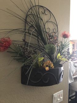 Rustic artificial plant holder.