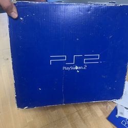PS2 with one controller and 4 games