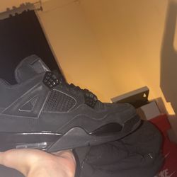 Black Cat Jordan 4s