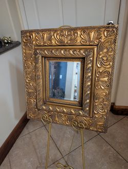 Ornate Gold Wall Mirror with Beveled Edge