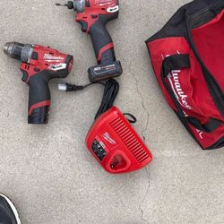 Impact Drill To Volt 4.0 Battery And A 2.0 Battery And Charger