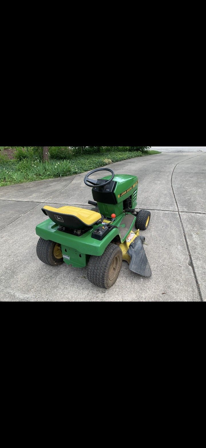 John Deere STX38 with Lawn Sweeper 42 Inch