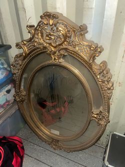 Gold mirror.  Price sticker still on