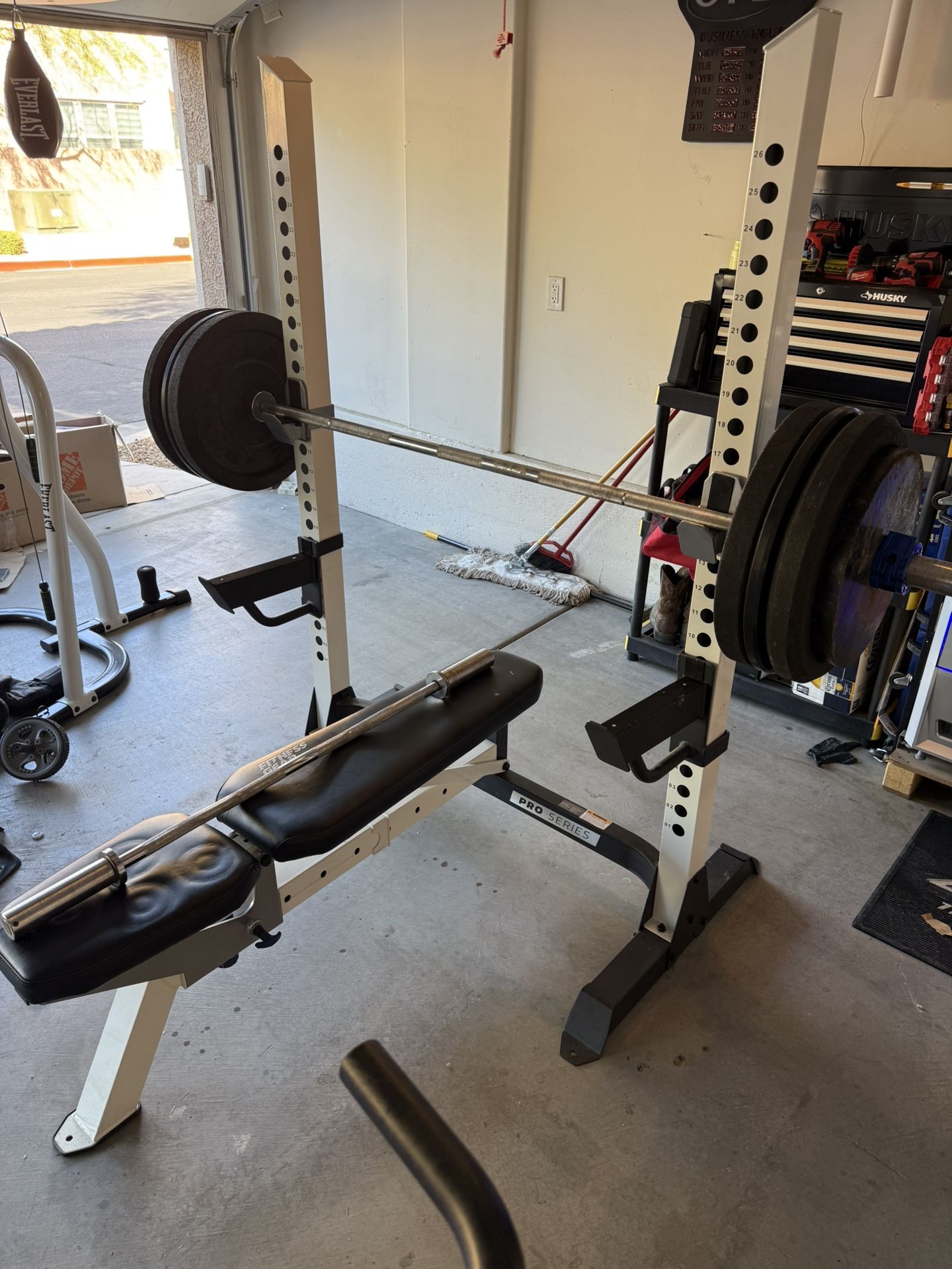BENCH PRESS WITH WEIGHTS AND BAR