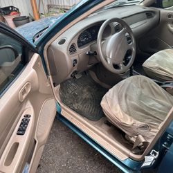 Ford Scort año 1998 4 Puertas Automático 173505 Millas  Color Verde 