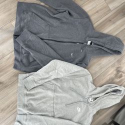 Nike zip-up and Nike sweater