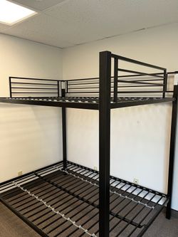 Black full-over-full metal low bunk beds