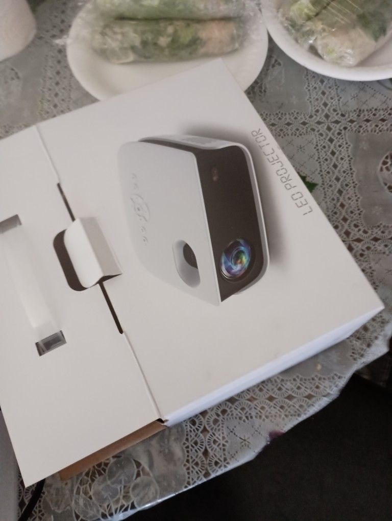LED Mini Smart Projector ( Phones, Fire stick,Roku,Xbox,PSP,Laptops,Tablets,Etc .)