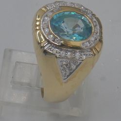 10KT YELLOW GOLD FASHION RING 6.1 GRAMS W LIGHT BLUE STONE SIZE10.25 MINT CONDITION. 866206-2
