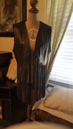 LEATHER VEST WITH FRINGES. I BOUGHT IT IN EUROPE.