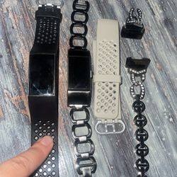 2 Fitbits And Accessories