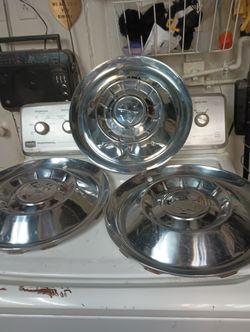 55mercury hubcaps