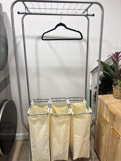 Rolling laundry hamper
