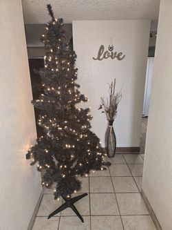 Pre-Lit 6.5' Black Pencil Fraser Fir Artificial Christmas Tree with 250 Lights, Halloween, house, apartment,  decor. Style.

Pickup East side El Paso 