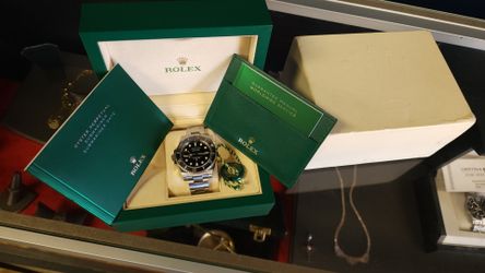 Rolex Submariner 116610LN is a 40mm steel dive watch.