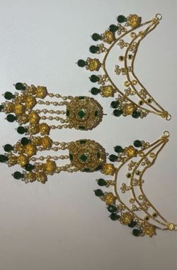 Gold Tone Jhoomar Earrings with Green Stones