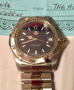 Men's dive watch 200 meter Tag Heuer blue dial stainless bracelet