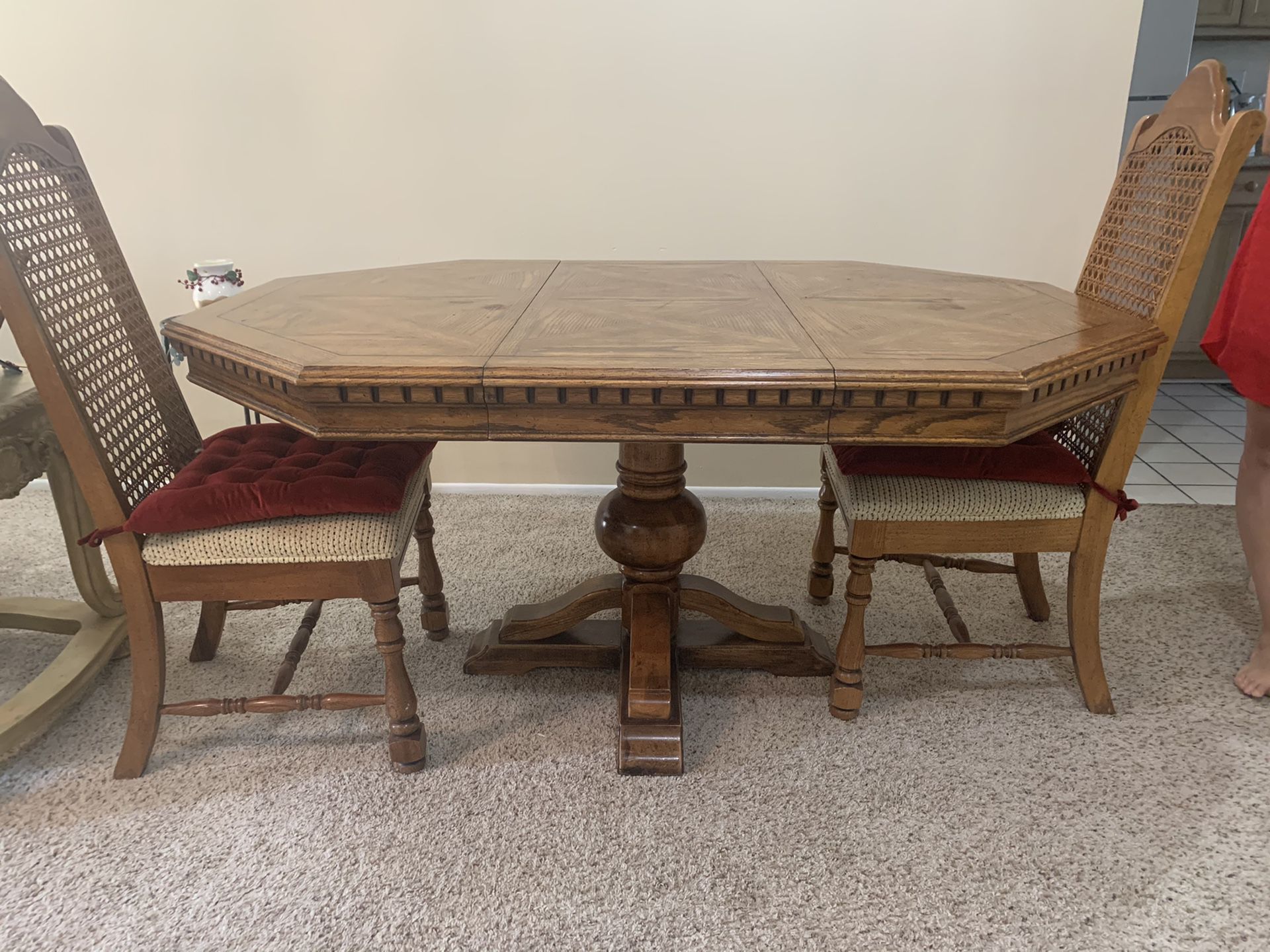 Wooden table with two chairs