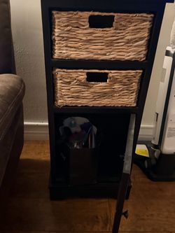 Black Storage Unit with Wicker Baskets