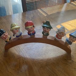 Six vintage porcelain, cork, stoppers liquor pours