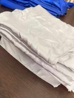 Silver satin table runners