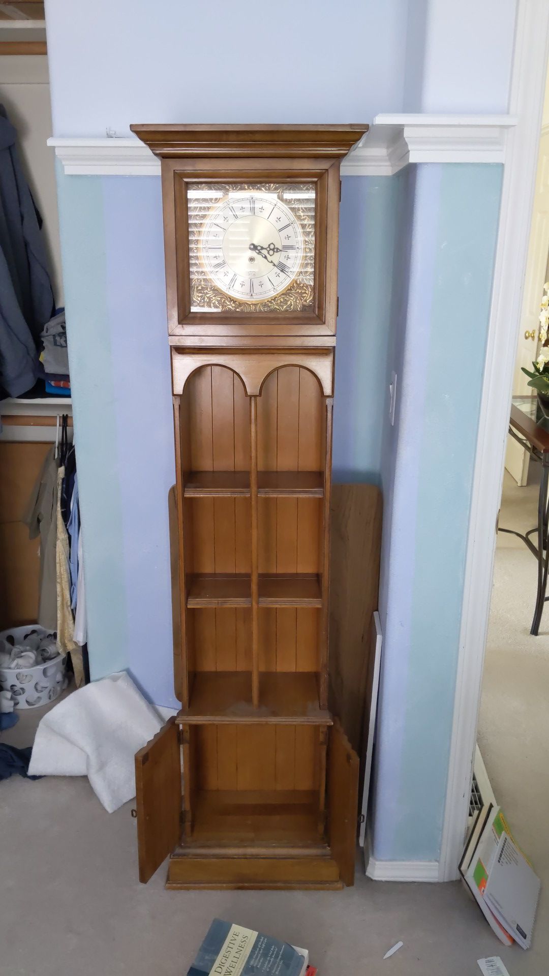 Antique Butler bookshelf with clock