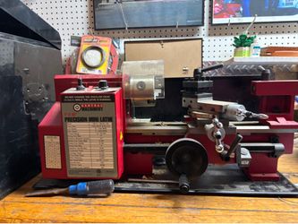 Precision mini lathe/ with cutters and many other assessors