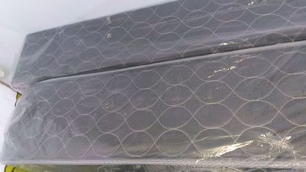 New twin mattress and box spring with railing
